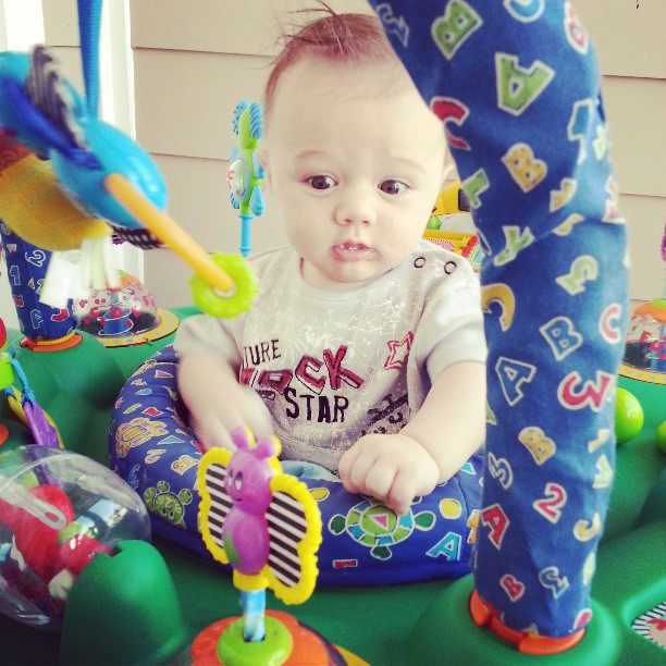 He loves his exersaucer #growinguptoofast